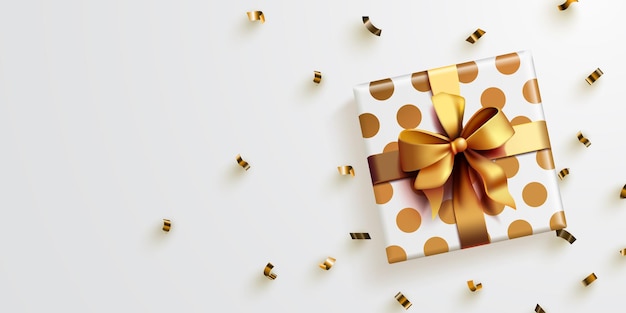 Caja de regalos con confeti dorado
