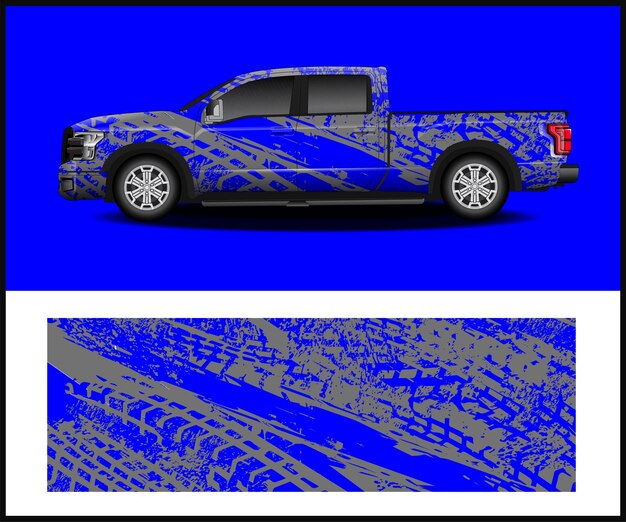 Una camioneta azul y plateada con la palabra vado en el lateral.
