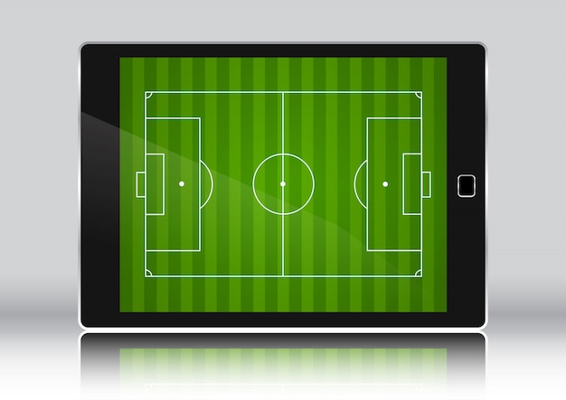 Campo de fútbol en una tableta eletronic dispositivo