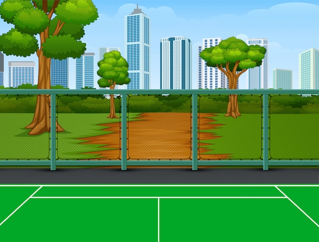 Cancha de tenis en el parque con fondo de ciudad