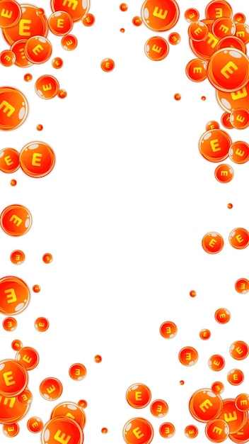 Cápsulas redondas de vitamina E esparcidas al azar