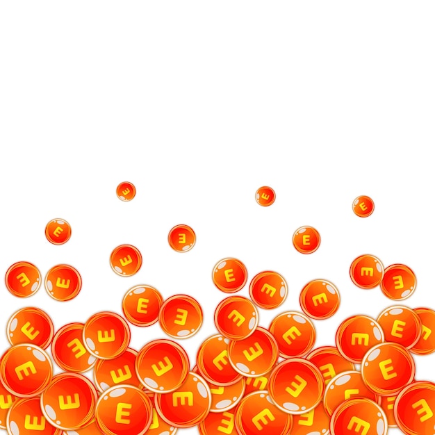 Cápsulas redondas de vitamina E esparcidas al azar