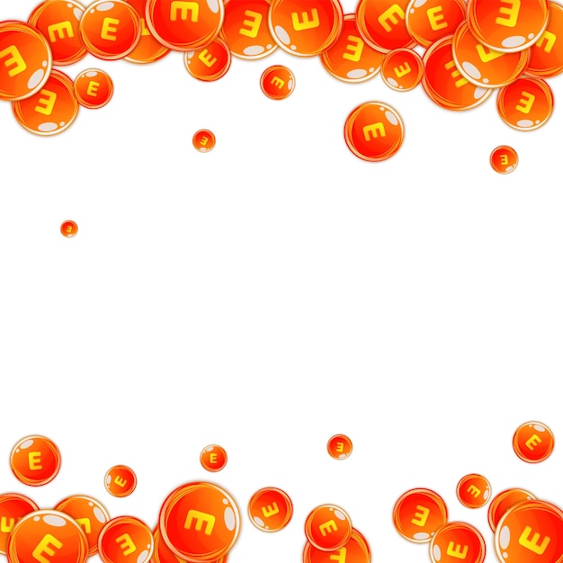 Cápsulas redondas de vitamina E esparcidas al azar