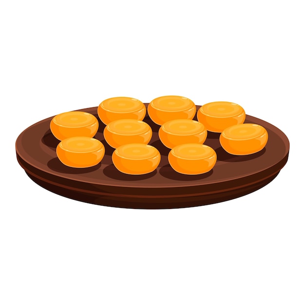 Caramelo naranja redondo sentado en un plato marrón