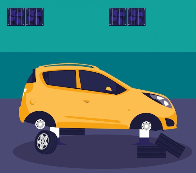 Carro amarillo en taller de mantenimiento