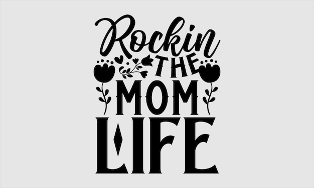 Un cartel que dice rockin the mom life.