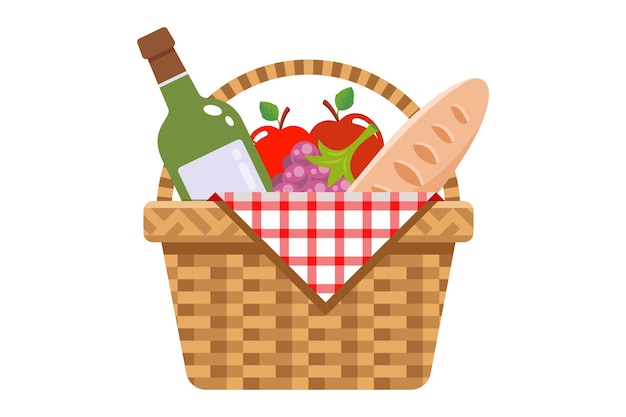 Cesta de picnic con cena navideña de frutas y vino en el césped