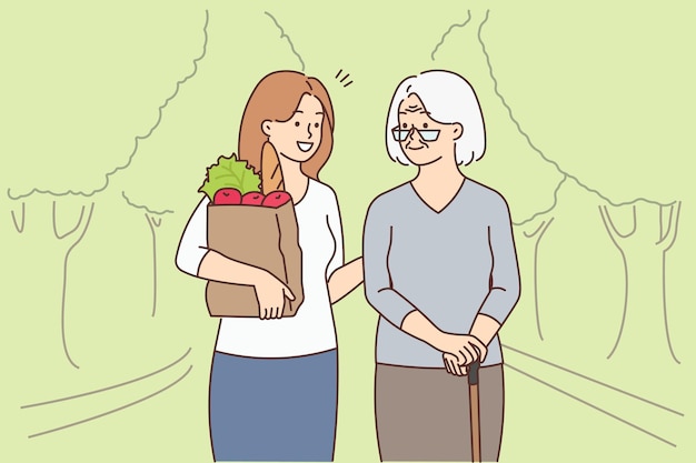 Chica con comestibles ayuda a la abuela