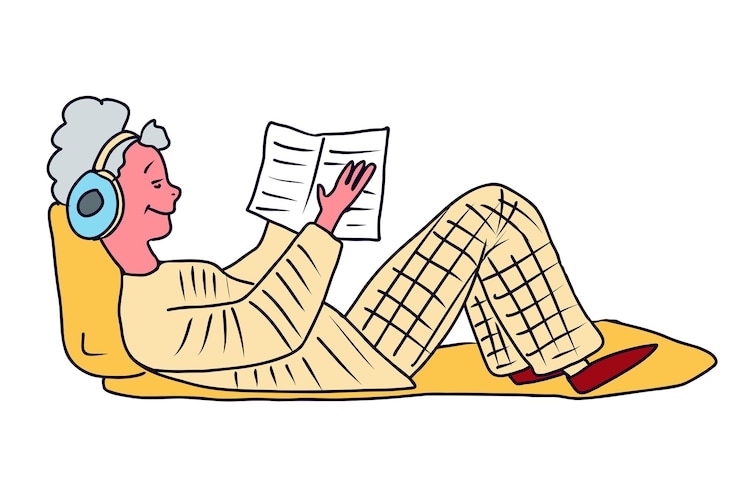 Vector una chica en pijama se acuesta en la cama y lee un libro de ilustraciones vectoriales dibujadas a mano