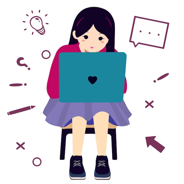 Una chica trabajando en una laptop.