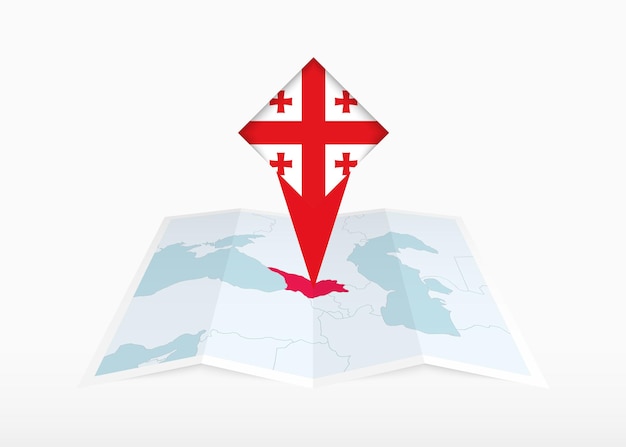Chile está representado en un mapa de papel doblado y un marcador de ubicación fijado con la bandera de Chile
