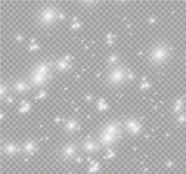 Las chispas de polvo y las estrellas doradas brillan con una luz especial. brilla sobre un fondo transparente. Efecto de luz navideña. Partículas de polvo mágico espumoso.