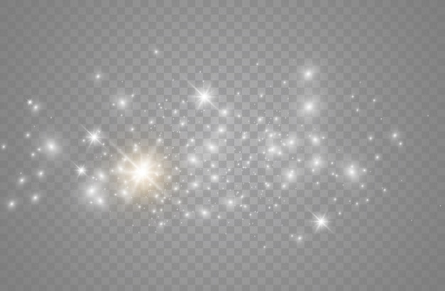 Las chispas de polvo y las estrellas doradas brillan con una luz especial. brilla sobre un fondo transparente. Partículas de polvo mágico espumoso.
