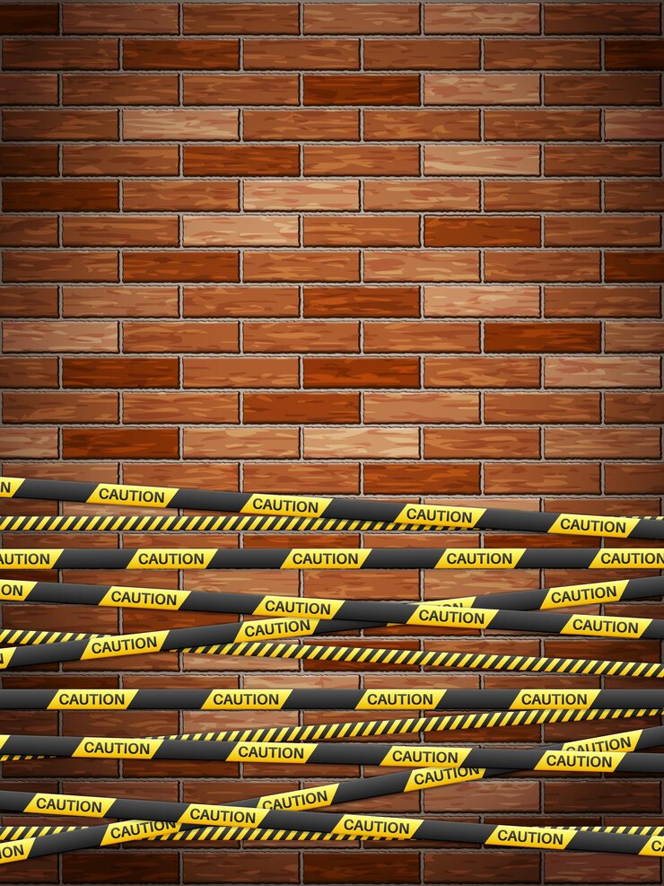 Vector cinta de advertencia en el fondo de ladrillos