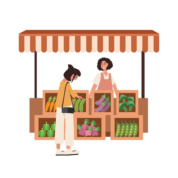 Un cliente compra verduras frescas en un mercado de agricultores
