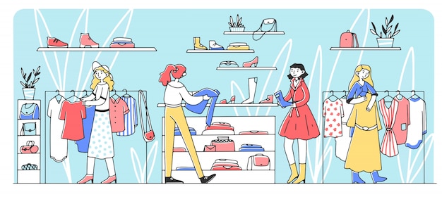 Clientes femeninos felices que eligen ropa en la tienda de moda