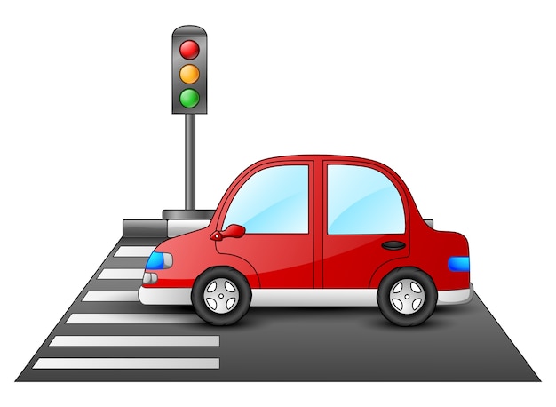 Coche rojo y semáforos en un paso de peatones
