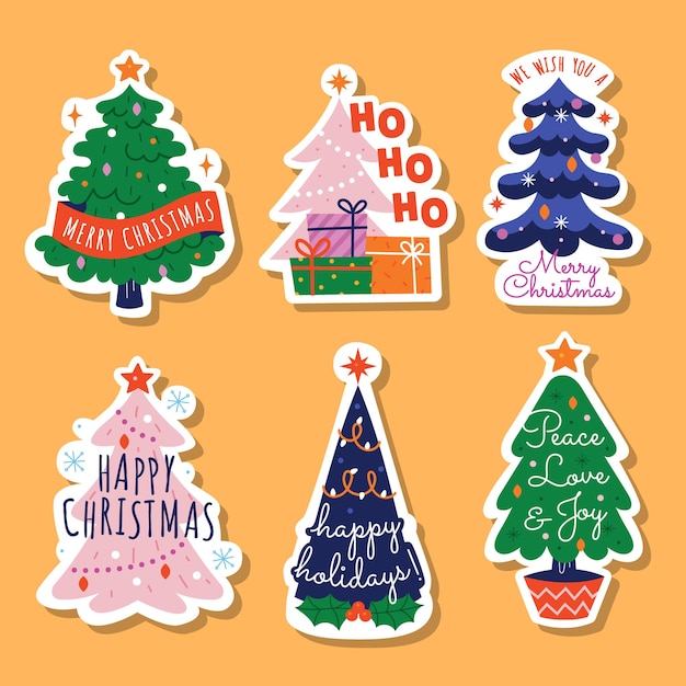 una colección de árboles de Navidad con un letrero que dice Feliz Navidad
