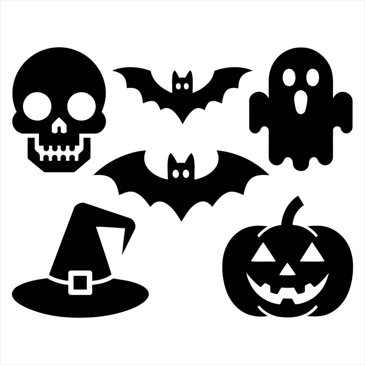 una colección de artículos de Halloween incluyendo una bruja y una bruja