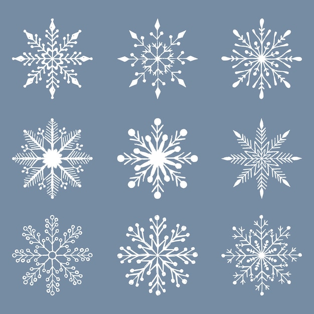 Colección de copos de nieve de invierno íconos de invierno dibujados a mano símbolos de nieve copos de Nieve aislados de la