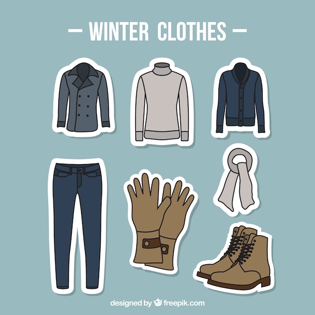 Colección de ropa de invierno con accesorios dibujados a mano 