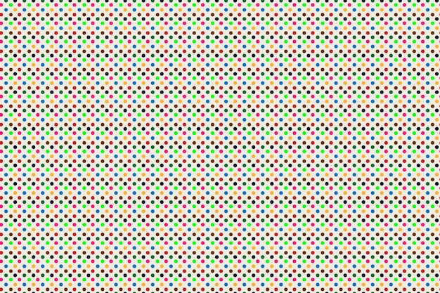 El colorido patrón de polcas en un fondo beige claro