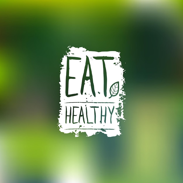 Coma el logotipo vectorial saludable con letras escritas a mano Etiqueta de alimentos orgánicos en el fondo borroso Signo ecológico Insignia de icono biológico para restaurante vegetariano embalaje de producto de café vegano