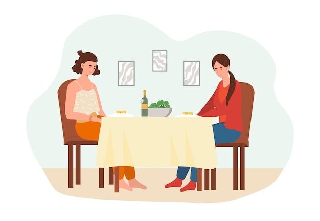 Concepto de comida saludable dos mujeres están sentadas en una mesa y comiendo verduras saludables en pleno estado