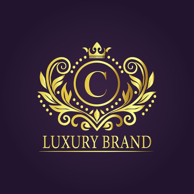 El concepto del logotipo de oro de lujo de la letra C