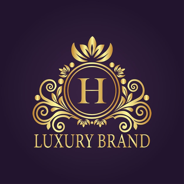 El concepto del logotipo de oro de lujo de la letra H