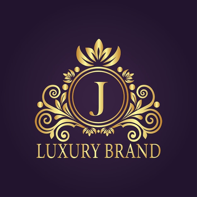 El concepto del logotipo de oro de lujo de la letra J