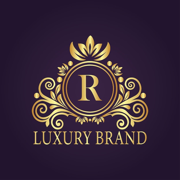 El concepto del logotipo de oro de lujo de la letra R