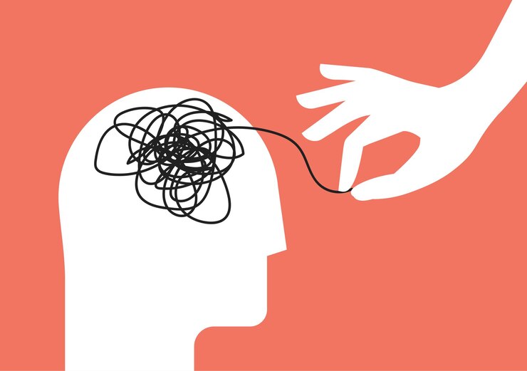 Concepto de sesión de terapia psicológica con silueta de cabeza humana y mano amiga que desenreda la maraña de pensamientos desordenados con trastorno mental, ansiedad y confusión, mente o estrés