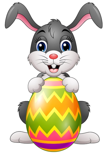 Conejito de dibujos animados con huevo de Pascua