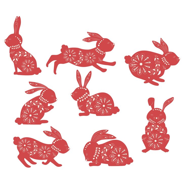 Conejo de Pascua en patrones étnicos en colores y vegetación con diferentes emblemas y plantas