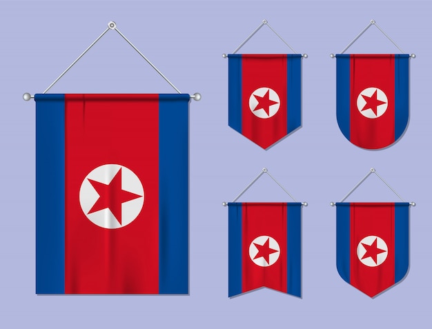 Conjunto de banderas colgantes corea del norte con textura textil. formas de diversidad del país de bandera nacional. banderín de plantilla vertical