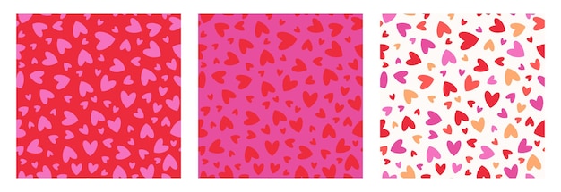 Conjunto de brillantes patrones sin costuras con corazones de varios colores para los estampados festivos del Día de San Valentín