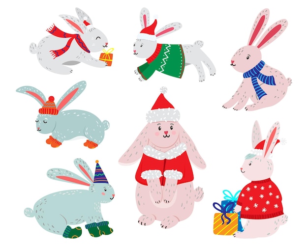 Conjunto de conejitos de Navidad lindos y divertidos Varios conejos en trajes de Navidad de invierno