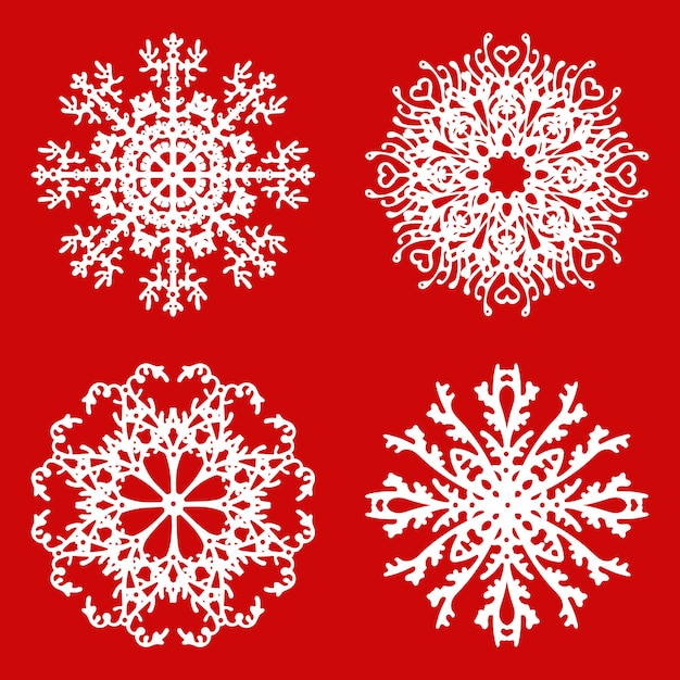 Conjunto de copos de nieve aislado sobre fondo rojo para el diseño de navidad vector premium