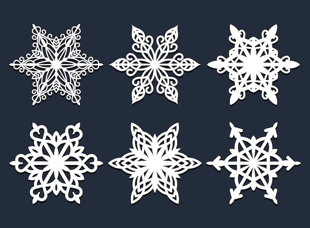 Conjunto de copos de nieve calados de corte por láser. Silueta de vector de decoración de Navidad