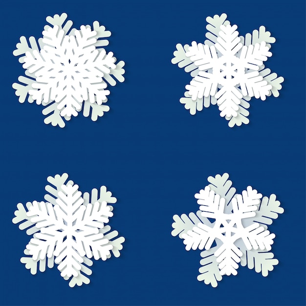 Conjunto de copos de nieve de papel de navidad blanco y azul