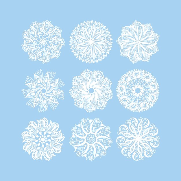 Conjunto de decoración de copos de nieve de Navidad aislado en encaje de círculo azul redondo ornamental