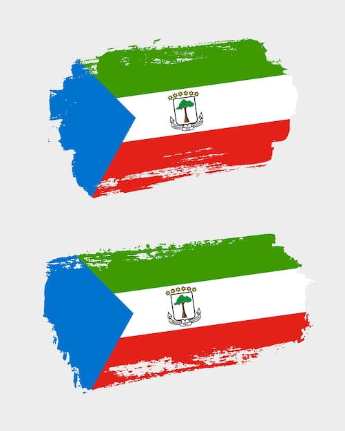 Conjunto de dos banderas creativas pintadas con pincel del país de Guinea Ecuatorial con fondo sólido