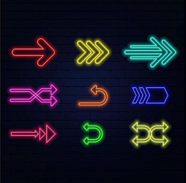 Un conjunto de flechas de neón y punteros de diferentes colores en el fondo de la pared