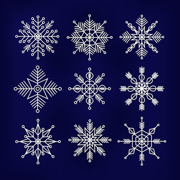 Conjunto de hermosos y complejos copos de nieve navideños blancos sobre fondo azul