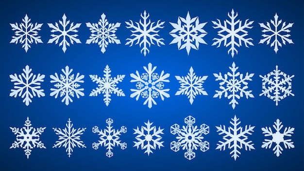 Conjunto de hermosos copos de nieve de Navidad complejos blancos sobre fondo azul