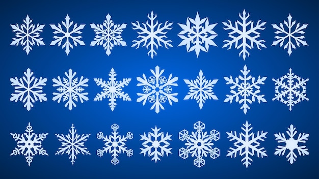 Conjunto de hermosos copos de nieve de navidad complejos blancos sobre fondo azul