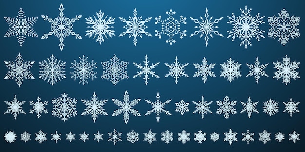 Conjunto de hermosos copos de nieve de Navidad complejos blancos sobre fondo azul