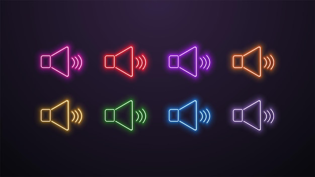 Un conjunto de iconos de altavoces de neón y auriculares en diferentes colores sobre un fondo oscuro