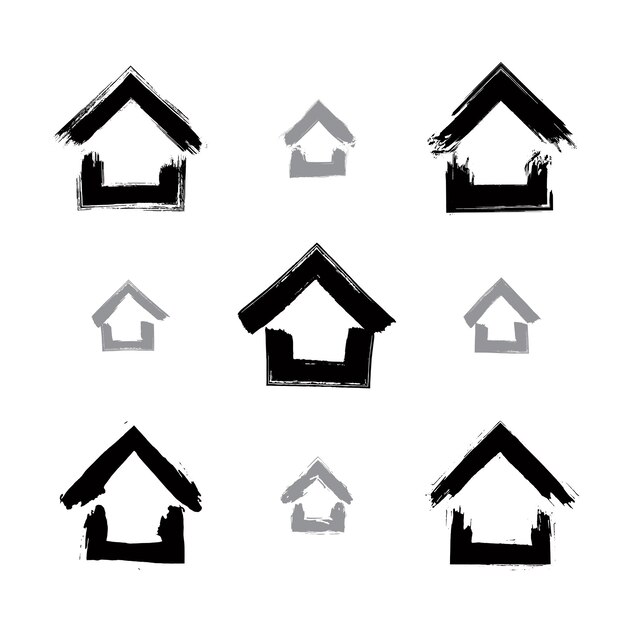 Conjunto de íconos domésticos monocromáticos dibujados a mano, colección de logotipos de fincas en blanco y negro, letreros simples de cabañas. Símbolos de casa pintados a mano creados con pincel de tinta real aislado sobre fondo blanco.